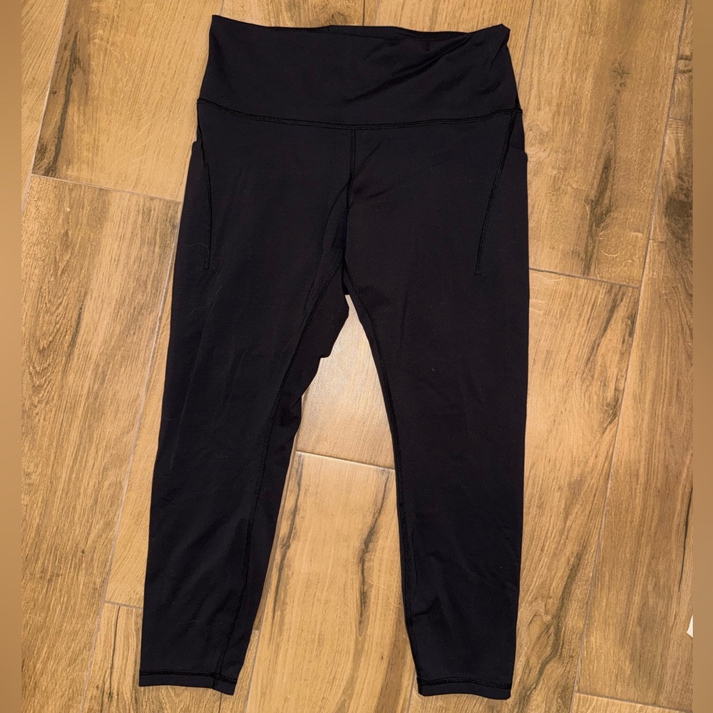 Black Lululemon Wunder Train Leggings with Pockets
Size 14, High rise, 25”